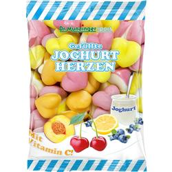 Bunte, gefüllte Joghurtherzen in einer Verpackung mit Früchten aufgedruckt.